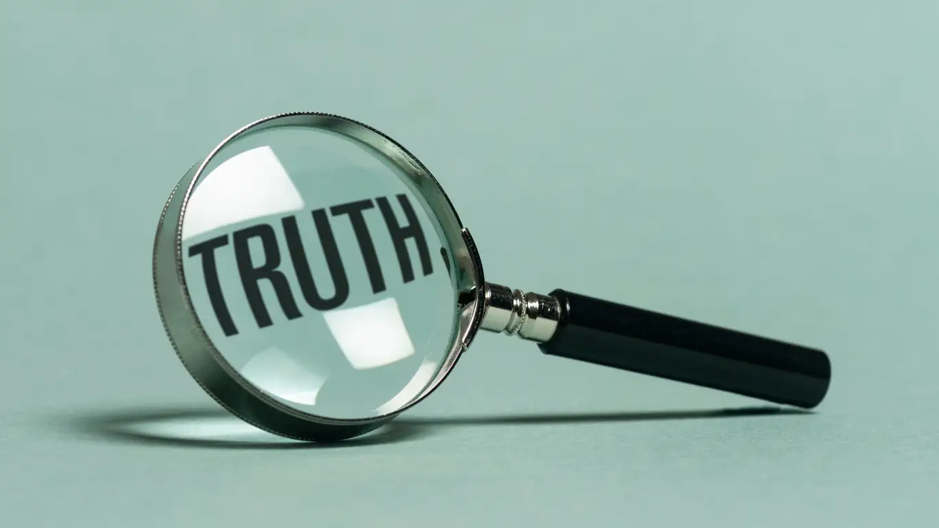 The cold, hard truth about SEO for small businesses Magnifying glass highlighting the word “truth,” symbolizing the reality of SEO